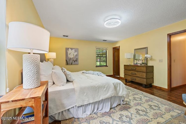 2768 N Periwinkle Ave, Middleburg, FL 32068 - bedroom featuring wood finished floors and baseboards