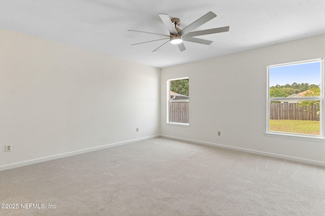 96002 Coral Reef Rd, Yulee, FL 32097 - unfurnished room with a ceiling fan, baseboards, and light colored carpet