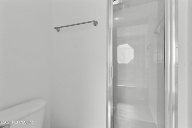 96002 Coral Reef Rd, Yulee, FL 32097 - bathroom featuring toilet and a shower stall