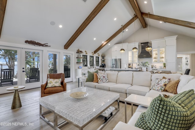 10351 County Road 13 N, Saint Augustine, FL 32092 - living room with high vaulted ceiling, beamed ceiling, light wood finished floors, and recessed lighting