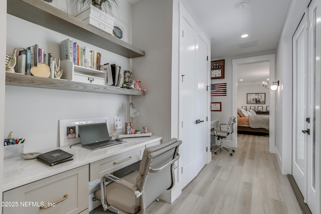 10351 County Road 13 N, Saint Augustine, FL 32092 - office area with built in desk, light wood-style flooring, and recessed lighting