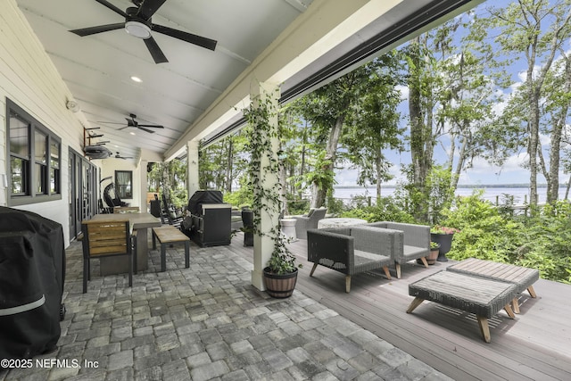 10351 County Road 13 N, Saint Augustine, FL 32092 - view of patio / terrace with a ceiling fan, outdoor dining area, a water view, area for grilling, and an outdoor living space