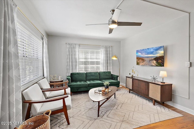 1838 Cherry St, Jacksonville, FL 32205 - living area with plenty of natural light, a ceiling fan, wood finished floors, and a heating unit