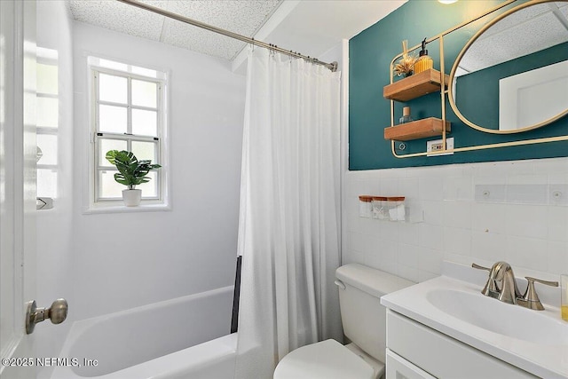 1838 Cherry St, Jacksonville, FL 32205 - full bath with tile walls, vanity, shower / tub combo with curtain, a paneled ceiling, and wainscoting