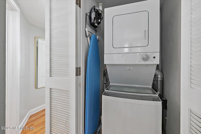 1838 Cherry St, Jacksonville, FL 32205 - washroom featuring estacked washer and dryer and wood finished floors
