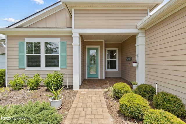 96167 Grande Oaks Ln, Fernandina Beach, FL 32034 - entrance to property with board and batten siding and covered porch
