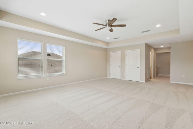 96167 Grande Oaks Ln, Fernandina Beach, FL 32034 - unfurnished bedroom with light colored carpet, baseboards, recessed lighting, and ceiling fan