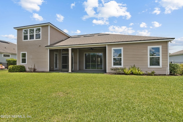 96167 Grande Oaks Ln, Fernandina Beach, FL 32034 - rear view of property with roof with shingles and a sunroom