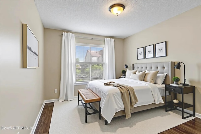 5631 Ortega Park Blvd, Jacksonville, FL 32244 - bedroom with dark wood-style flooring, baseboards, and a textured ceiling