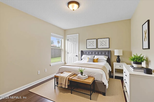 5631 Ortega Park Blvd, Jacksonville, FL 32244 - bedroom with wood finished floors, baseboards, and a textured ceiling