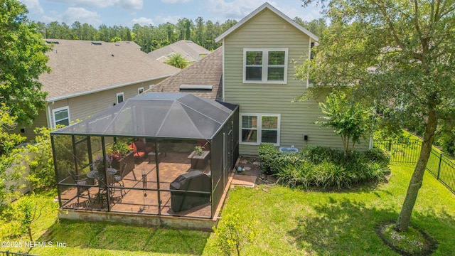 2538 Las Calinas Blvd, Saint Augustine, FL 32095 - back of house with a patio, glass enclosure, and roof with shingles