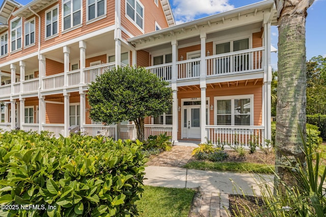 1899 White Sands Way Unit 704, Fernandina Beach, FL 32034 - view of front facade with a balcony and a porch
