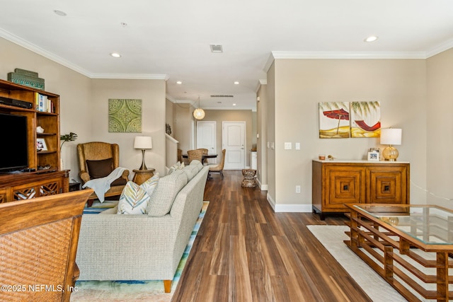 1899 White Sands Way Unit 704, Fernandina Beach, FL 32034 - living area featuring wood finished floors, baseboards, recessed lighting, and crown molding