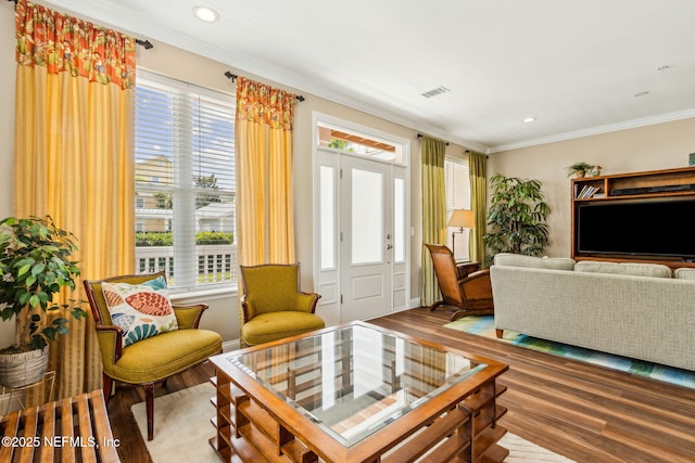 1899 White Sands Way Unit 704, Fernandina Beach, FL 32034 - living area featuring wood finished floors, crown molding, and recessed lighting