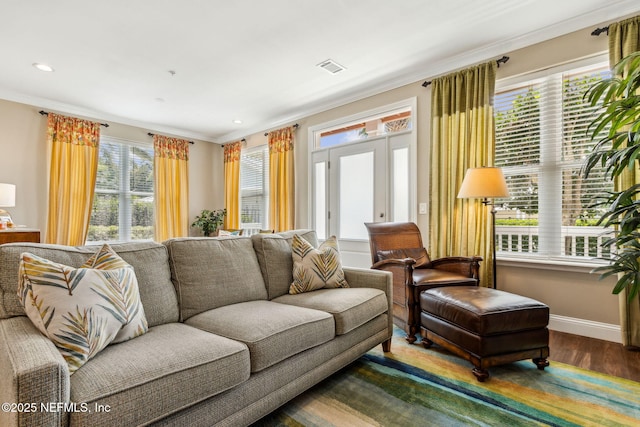 1899 White Sands Way Unit 704, Fernandina Beach, FL 32034 - living room featuring crown molding, wood finished floors, baseboards, and recessed lighting