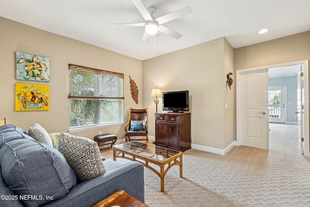 1899 White Sands Way Unit 704, Fernandina Beach, FL 32034 - living room featuring a ceiling fan, baseboards, and light colored carpet