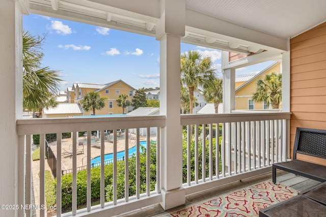 1899 White Sands Way Unit 704, Fernandina Beach, FL 32034 - balcony with view of pool area and a residential view