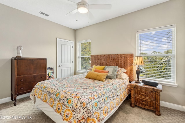 1899 White Sands Way Unit 704, Fernandina Beach, FL 32034 - carpeted bedroom with baseboards and ceiling fan