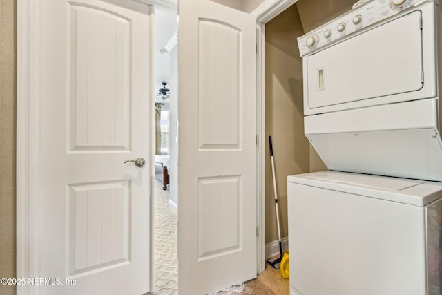 1899 White Sands Way Unit 704, Fernandina Beach, FL 32034 - washroom with stacked washer / drying machine