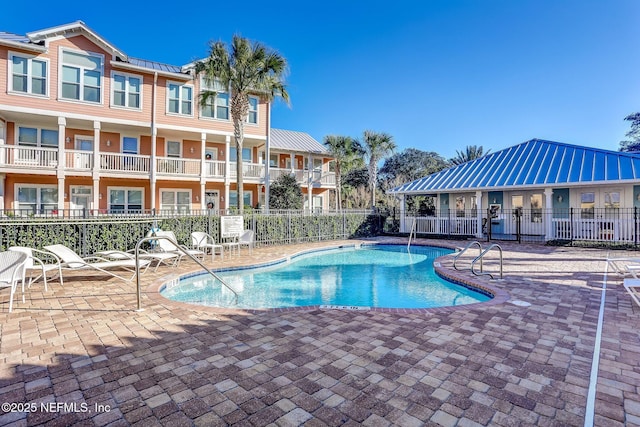 1899 White Sands Way Unit 704, Fernandina Beach, FL 32034 - community pool with a patio