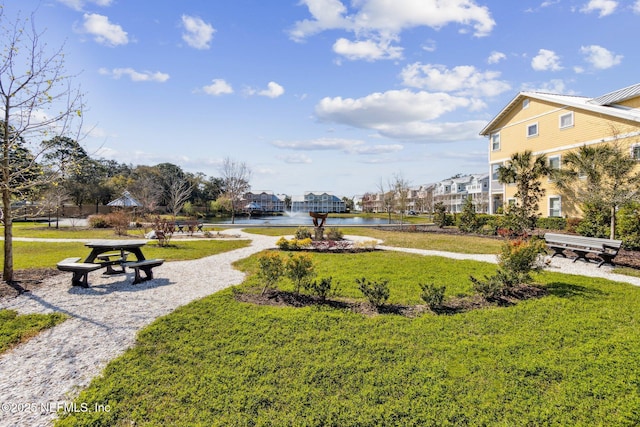 1899 White Sands Way Unit 704, Fernandina Beach, FL 32034 - view of property's community with a water view, a yard, and a residential view