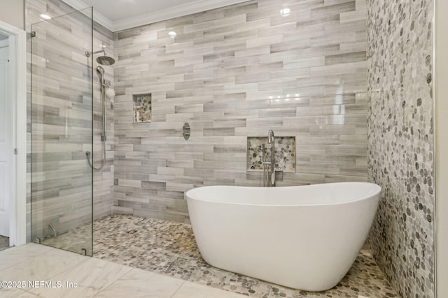 1899 White Sands Way Unit 704, Fernandina Beach, FL 32034 - full bathroom featuring a shower stall, a freestanding tub, crown molding, and tile walls