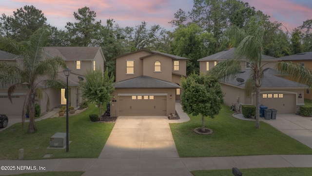 203 Buck Run Way, Saint Augustine, FL 32092 - traditional-style house with driveway, stucco siding, a garage, and a front lawn