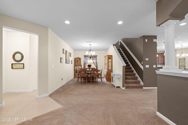 203 Buck Run Way, Saint Augustine, FL 32092 - dining area featuring decorative columns, a chandelier, light carpet, stairway, and recessed lighting
