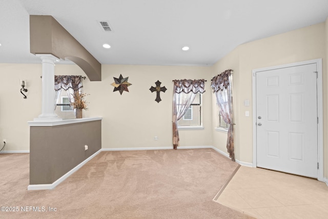 203 Buck Run Way, Saint Augustine, FL 32092 - carpeted foyer entrance with ornate columns, plenty of natural light, and recessed lighting