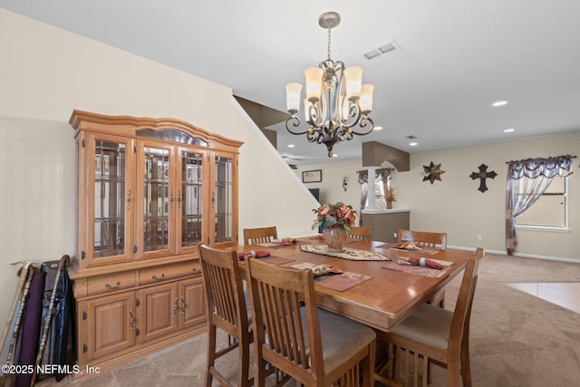 203 Buck Run Way, Saint Augustine, FL 32092 - dining area with light colored carpet, a chandelier, and recessed lighting