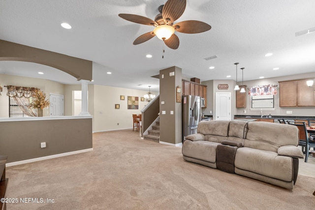 203 Buck Run Way, Saint Augustine, FL 32092 - living room with a ceiling fan, light colored carpet, decorative columns, recessed lighting, and stairway