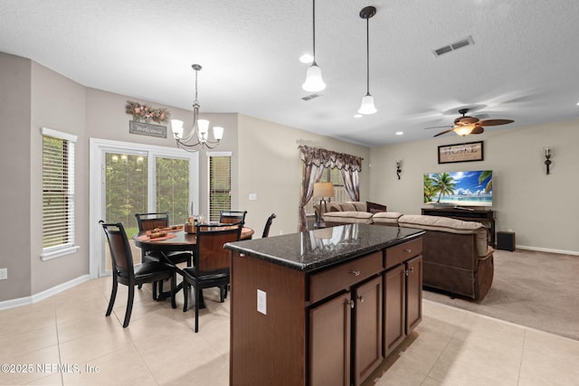 203 Buck Run Way, Saint Augustine, FL 32092 - kitchen with plenty of natural light, light tile patterned floors, a chandelier, a textured ceiling, and recessed lighting