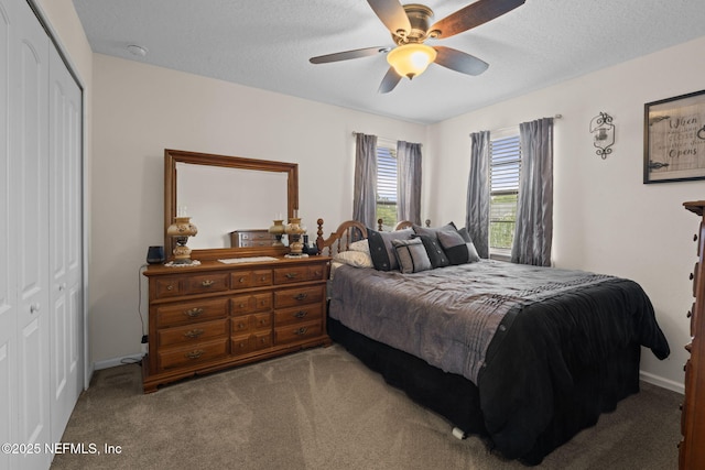 203 Buck Run Way, Saint Augustine, FL 32092 - bedroom with a closet, carpet flooring, a ceiling fan, and a textured ceiling