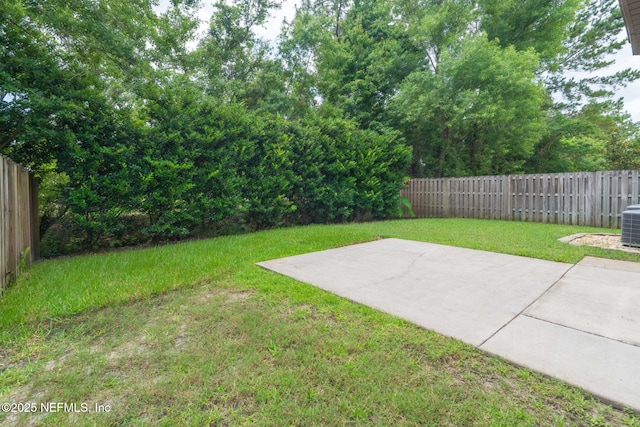 203 Buck Run Way, Saint Augustine, FL 32092 - fenced backyard with a patio area