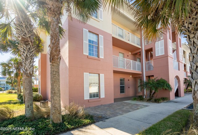 225 Atlantis Cir Unit 101-A, Saint Augustine Beach, FL 32080 - view of apartment building / complex