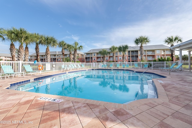 225 Atlantis Cir Unit 101-A, Saint Augustine Beach, FL 32080 - community pool featuring a patio area