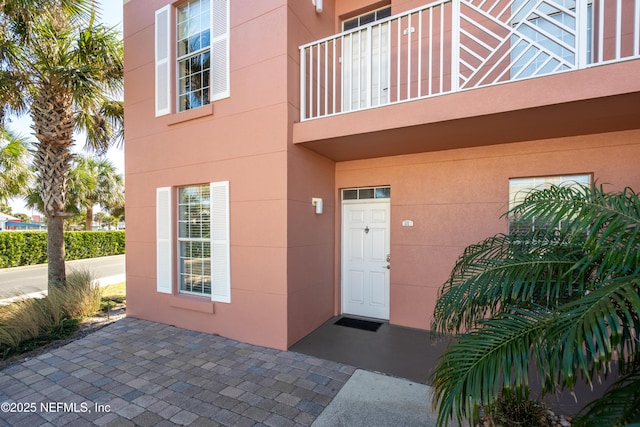 225 Atlantis Cir Unit 101-A, Saint Augustine Beach, FL 32080 - property entrance with stucco siding