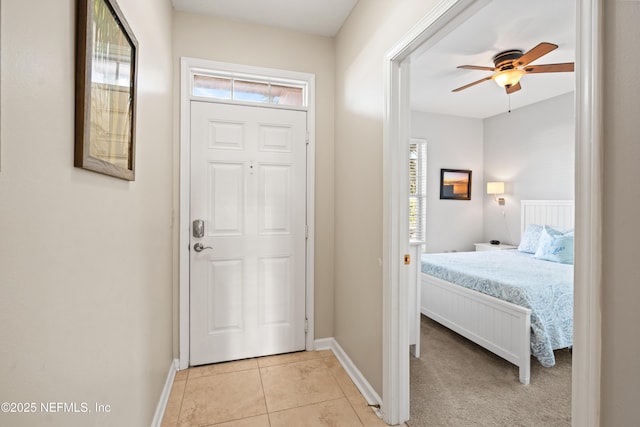 225 Atlantis Cir Unit 101-A, Saint Augustine Beach, FL 32080 - entrance foyer with plenty of natural light, baseboards, light tile patterned floors, and ceiling fan