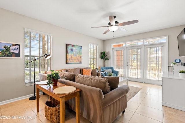 225 Atlantis Cir Unit 101-A, Saint Augustine Beach, FL 32080 - living room with light tile patterned floors, a ceiling fan, french doors, and baseboards