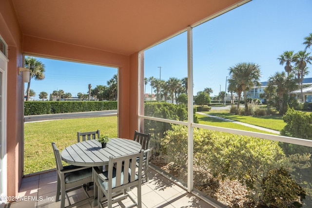 225 Atlantis Cir Unit 101-A, Saint Augustine Beach, FL 32080 - sunroom / solarium with outdoor dining space and healthy amount of natural light