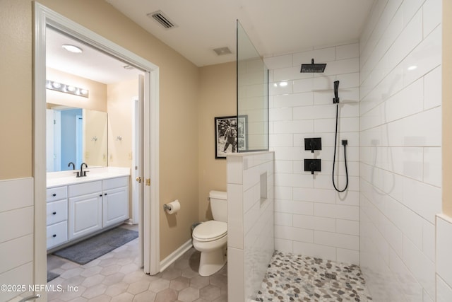 225 Atlantis Cir Unit 101-A, Saint Augustine Beach, FL 32080 - full bathroom featuring walk in shower, vanity, toilet, and tile patterned floors