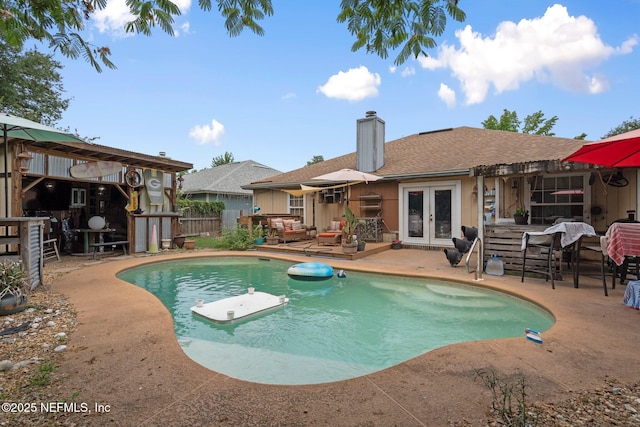 1942 Calusa Trl, Middleburg, FL 32068 - outdoor pool featuring french doors and a patio