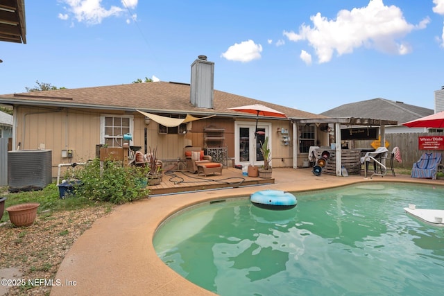 1942 Calusa Trl, Middleburg, FL 32068 - outdoor pool with cooling unit and a patio area