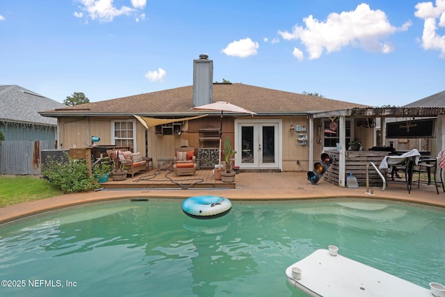1942 Calusa Trl, Middleburg, FL 32068 - swimming pool featuring french doors and a patio area