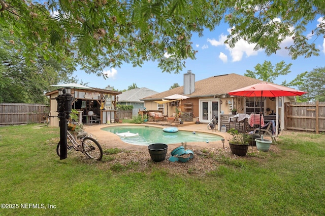 1942 Calusa Trl, Middleburg, FL 32068 - view of swimming pool featuring french doors and a patio area