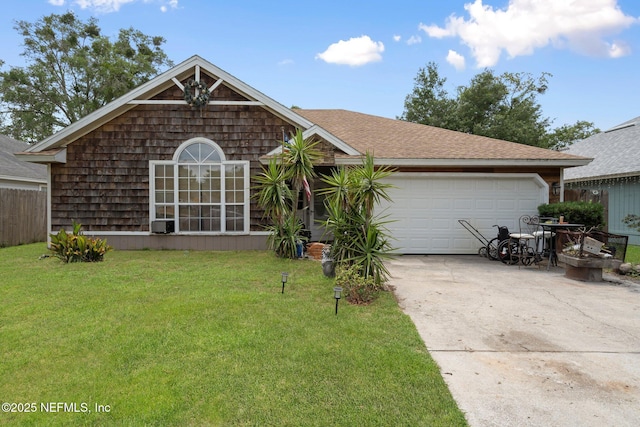 1942 Calusa Trl, Middleburg, FL 32068 - view of front of house featuring driveway, a garage, and roof with shingles