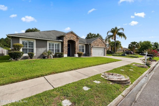 3592 Harrier Ct, Middleburg, FL 32068 - ranch-style house featuring stone siding, concrete driveway, a front lawn, a garage, and stucco siding