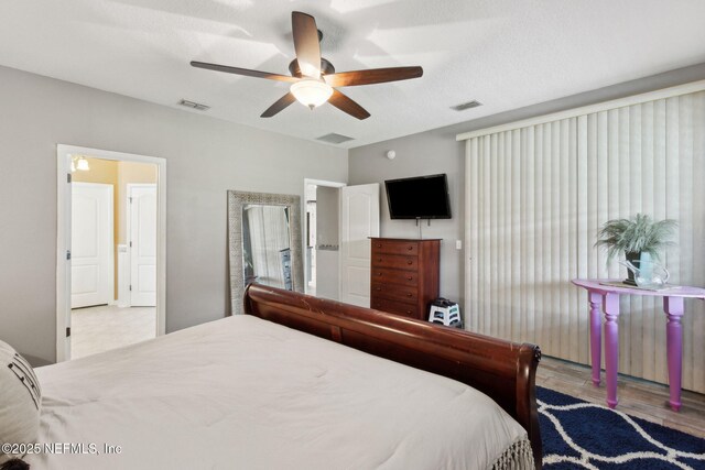 3592 Harrier Ct, Middleburg, FL 32068 - bedroom featuring wood finished floors and ceiling fan