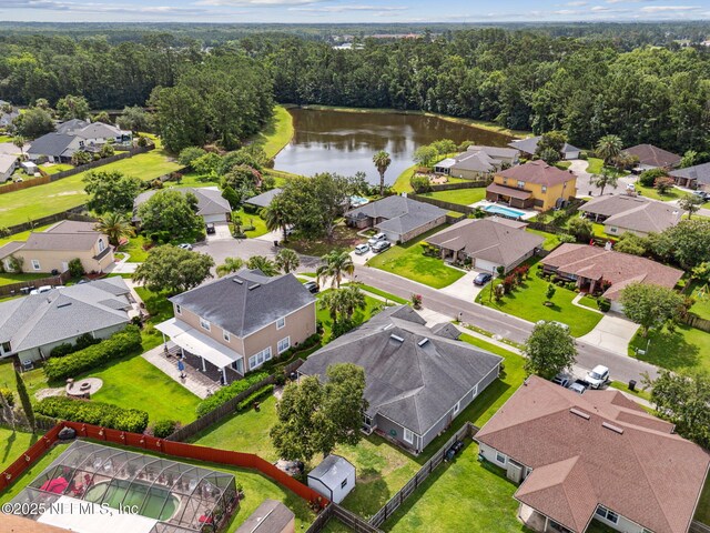 3592 Harrier Ct, Middleburg, FL 32068 - aerial perspective of suburban area with a nearby body of water and a forest
