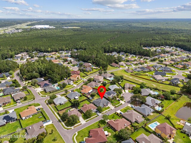 3592 Harrier Ct, Middleburg, FL 32068 - aerial view of property's location with a heavily wooded area and nearby suburban area